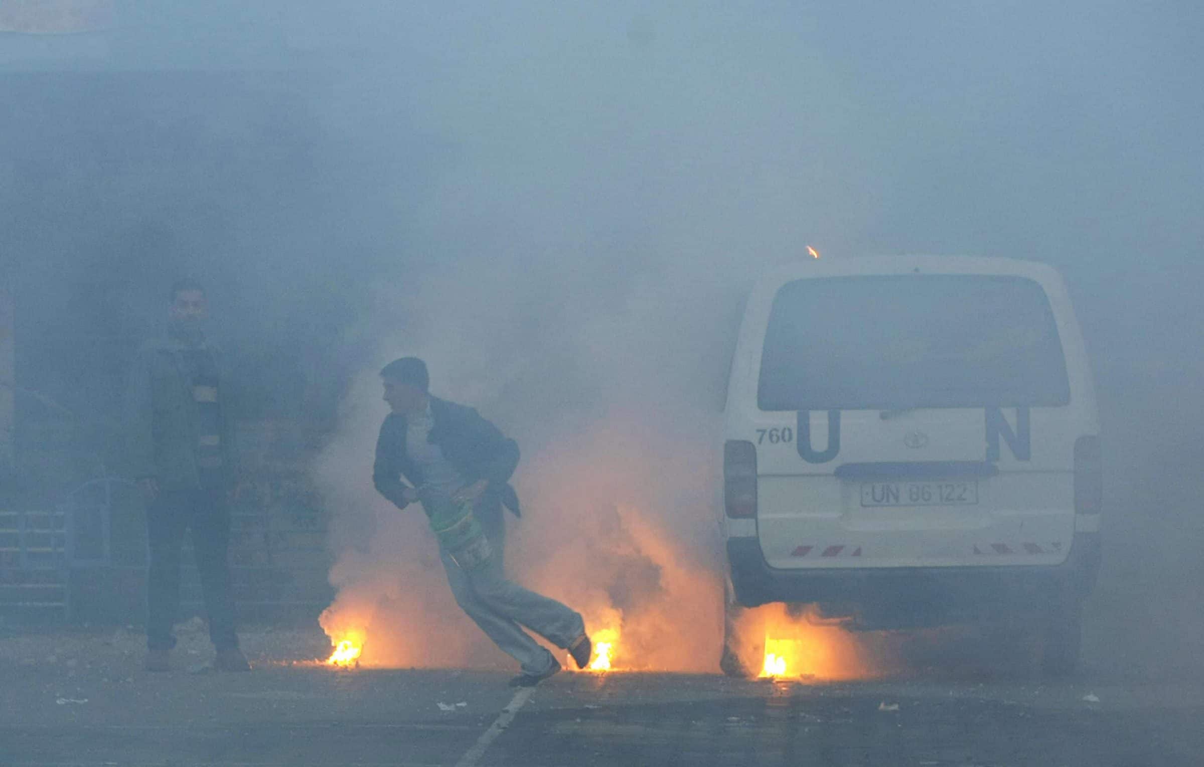 White Phosphorus on the ground - Israeli white phosphorus munitions strike a UN school, 17 Jan 2009 (Mohammed Abed/AFP/Getty Images)