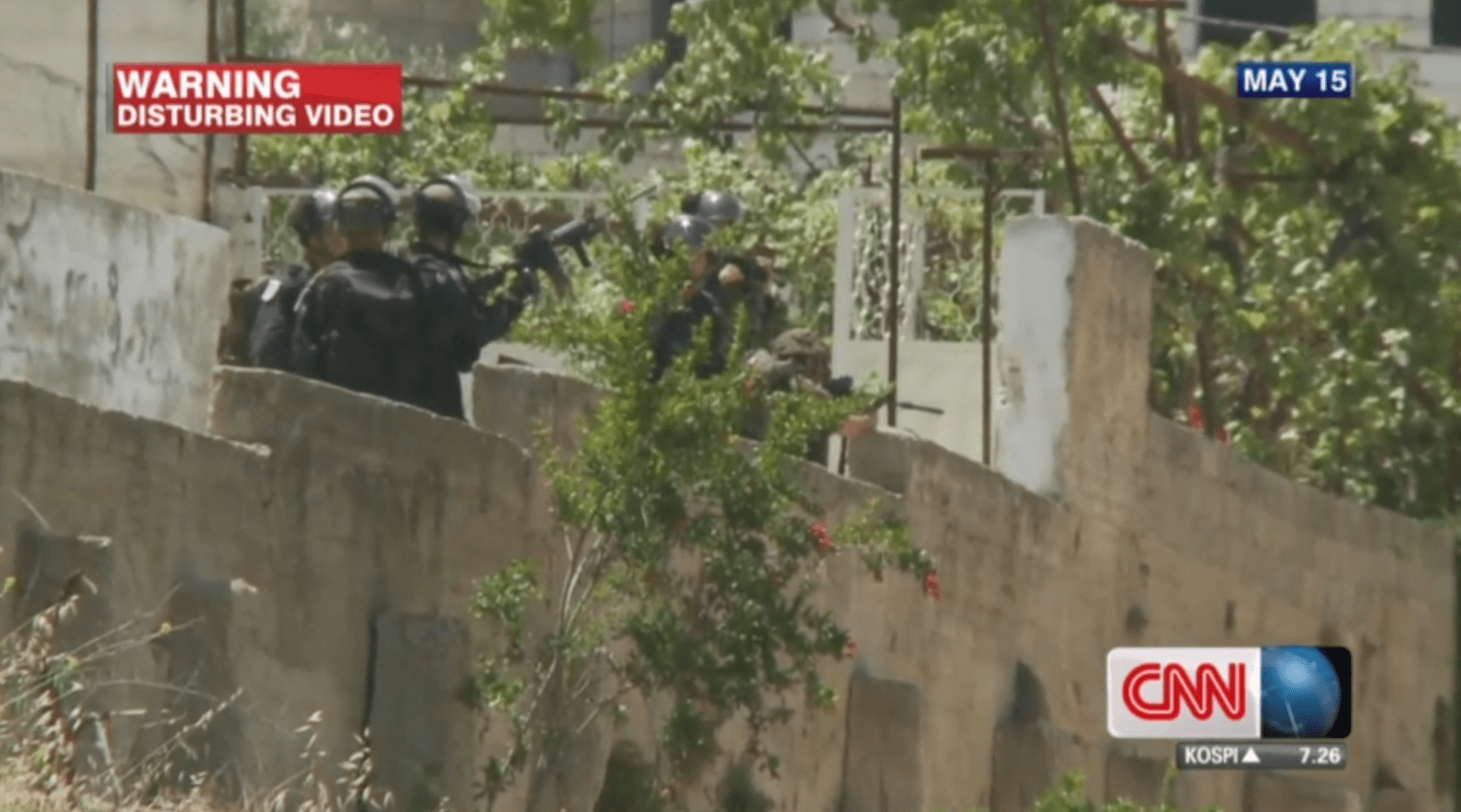 CNN – Still - A still from footage captured by a CNN producer on 15 May 2014. Nadeem Nawara's killer, Ben Deri, is one of the policemen captured in this image. (CNN)