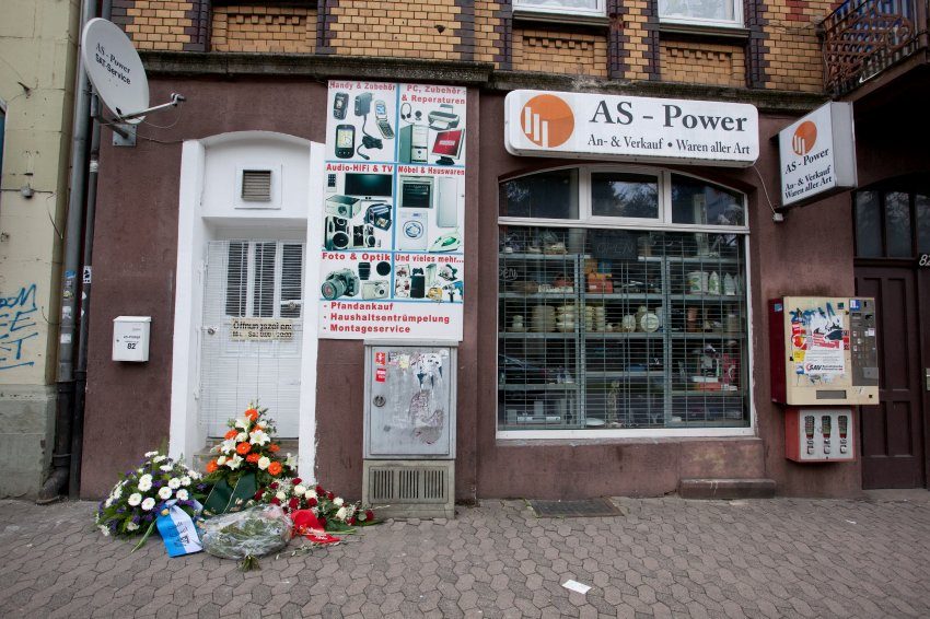 Internet café, Kassel - Flowers are left outside the front door of the Yozgats' internet café, April 2006. (Heiko Meyer/DAPD) Not for reproduction.