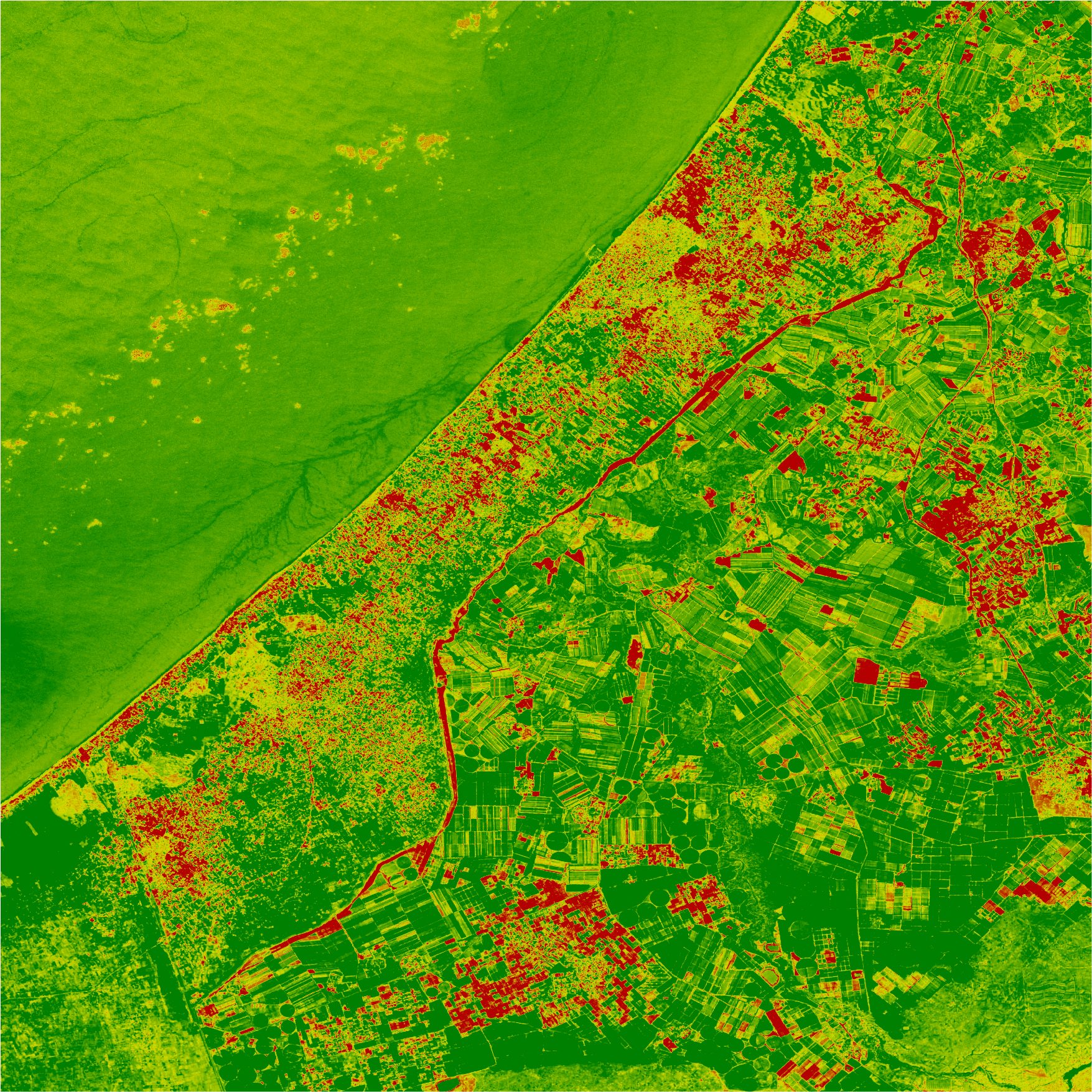 NDVI – 2 - This map displays long-term changes to visual indicators of vegetation health across the Gaza region over the past three decades of Israeli occupation. Red indicates areas in which vegetation was completely eradicated. 
Vegetated areas that have degraded over time are shown across a gradient from yellow to red in order to illustrate the severity of degradation over time. Areas that have become greener over time are shown across a gradient of light to dark green and occur mainly on the Israeli side of the perimeter. (Corey Scher)