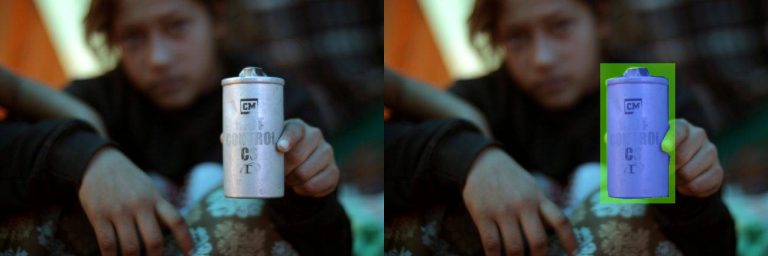 Straight angle of tear gas canister - FA has manually highlighted the pixels (green and blue transparent) in which the tear gas canister appears, so that it can be used as an image to train a machine learning algorithm. (Original image by Lucy Nicholson for Reuters, 2018)