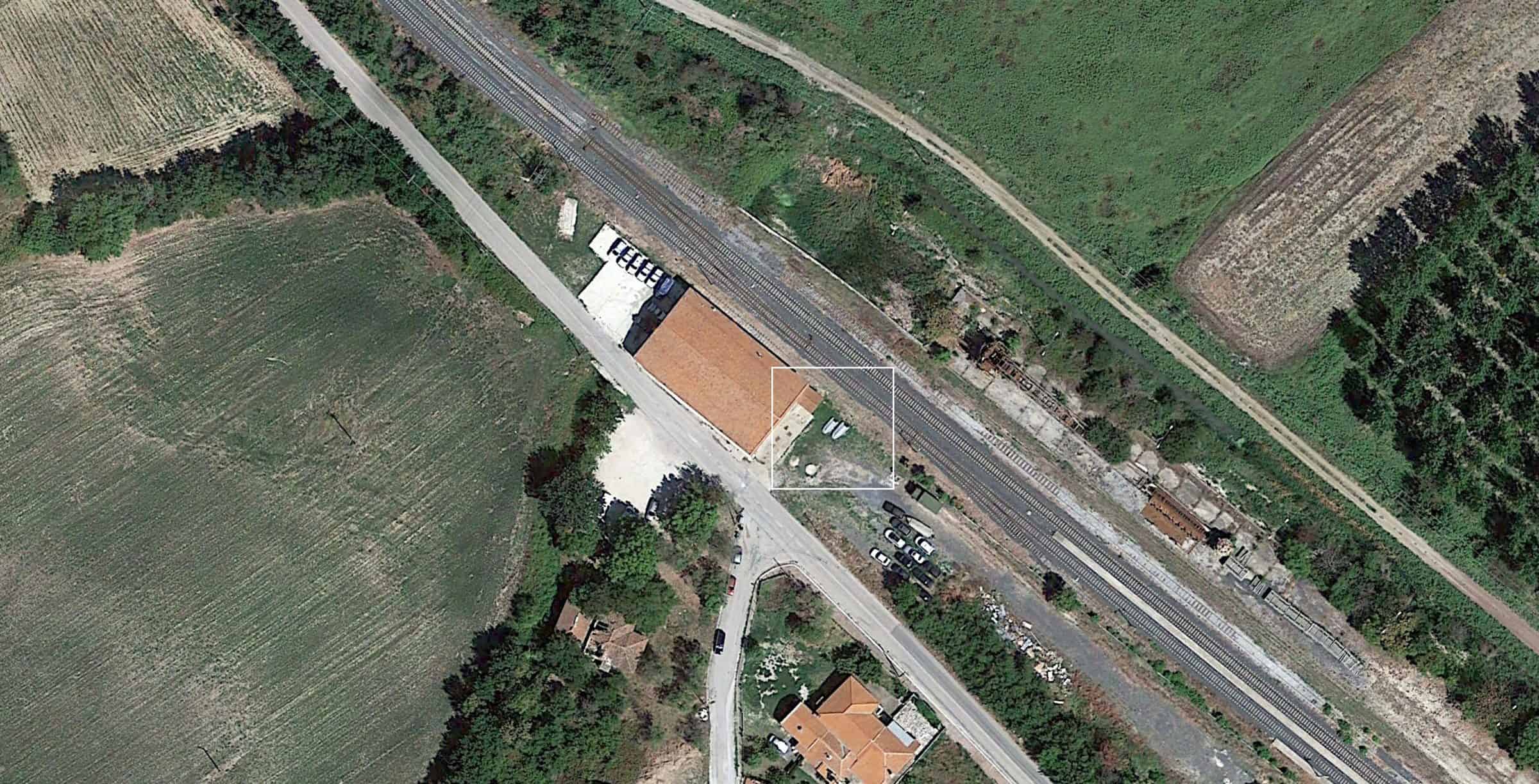 Inflatable Boats in Tychero, 2015 - Inflatable boats similar to the one used in the pushback depicted in satellite photos of Tychero Police Station, 28 August 2015. (Image courtesy of Google Earth)