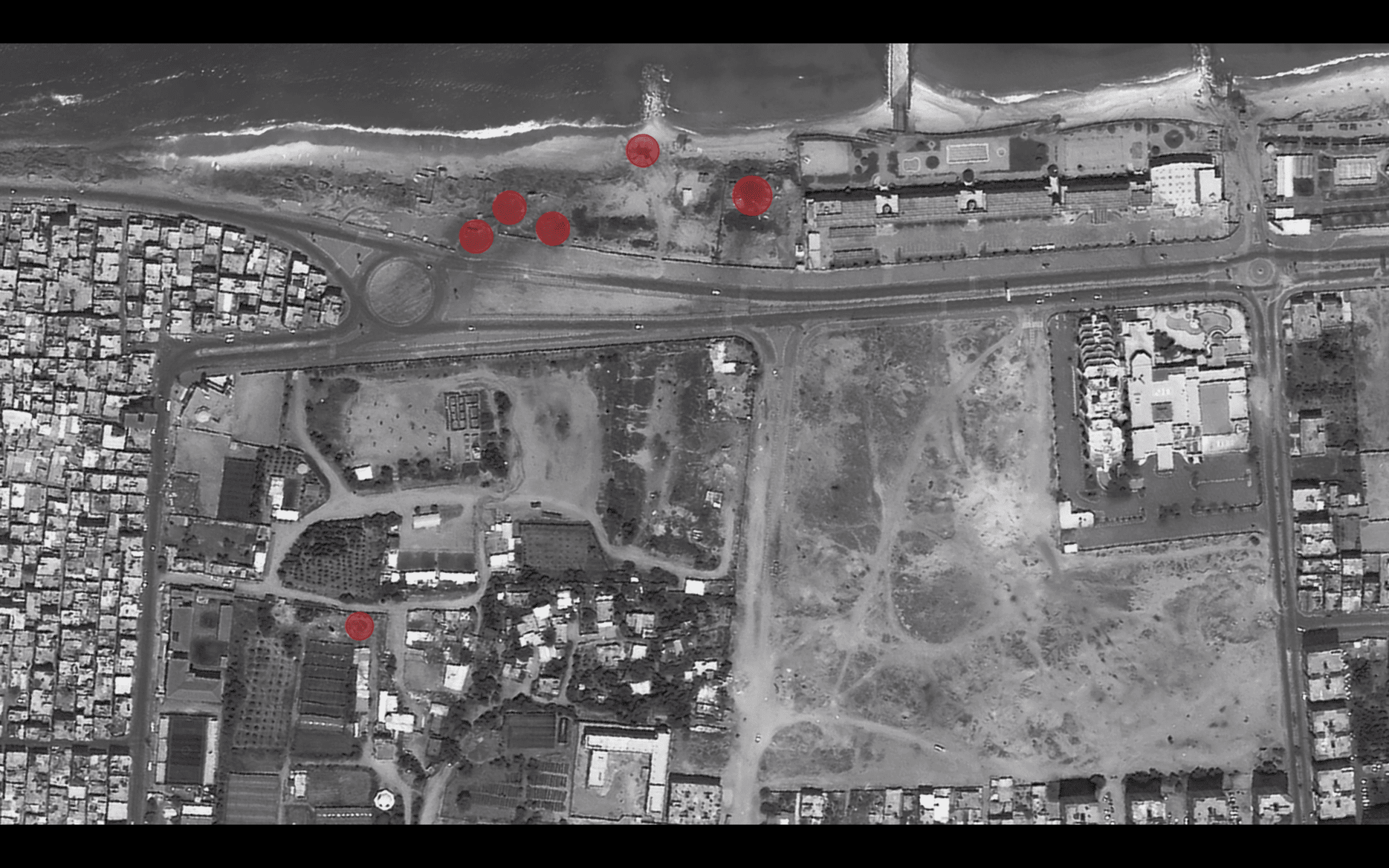 Gaza Arch_Image 12_2021 - Fig. 24 - Analysis of a 2021 satellite image (red circles indicate bomb craters or other evidence of damage). Image: Forensic Architecutre, 2022. Satellite maps by Soar.Earth