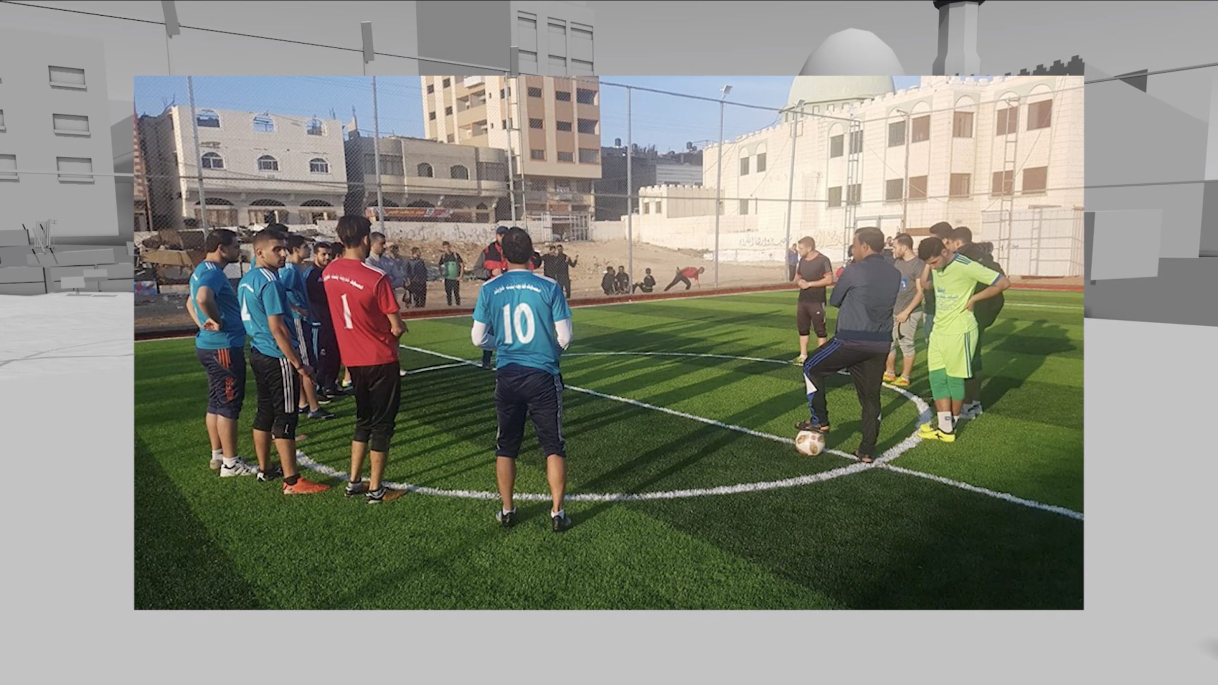  - Fig. 14: An image of local residents playing football, posted to Facebook by the local mosque. This image helped FA to model and locate the modern-day infrastructure on top of and near the archaeological site. External image source: مسجد شهداء الشاطئ - غزة (Shohada Al-Shati Mosque, Gaza), 21 November 2018. (Forensic Architecture, 2022)