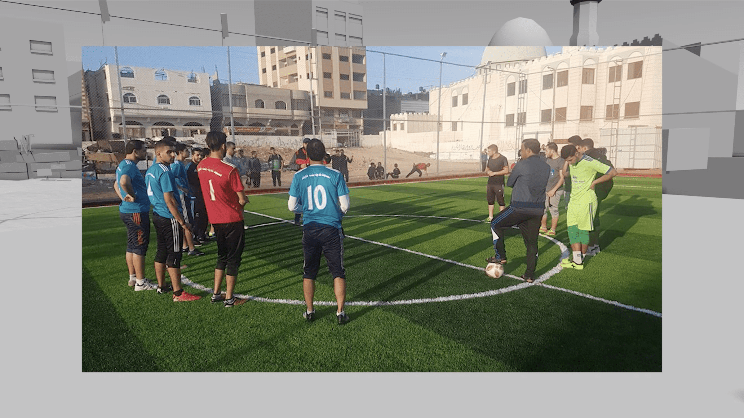 Gaza Arch_Image 26 - Fig. 14 - An image of local residents playing football, taken from the nearby mosque's Facebook page. This image helped us to model and locate the modern-day infrastructure on top of and near the ancient site. Image: مسجد شهداء الشاطئ - غزة (Shohada Al-Shati Mosque, Gaza), 21 November 2018