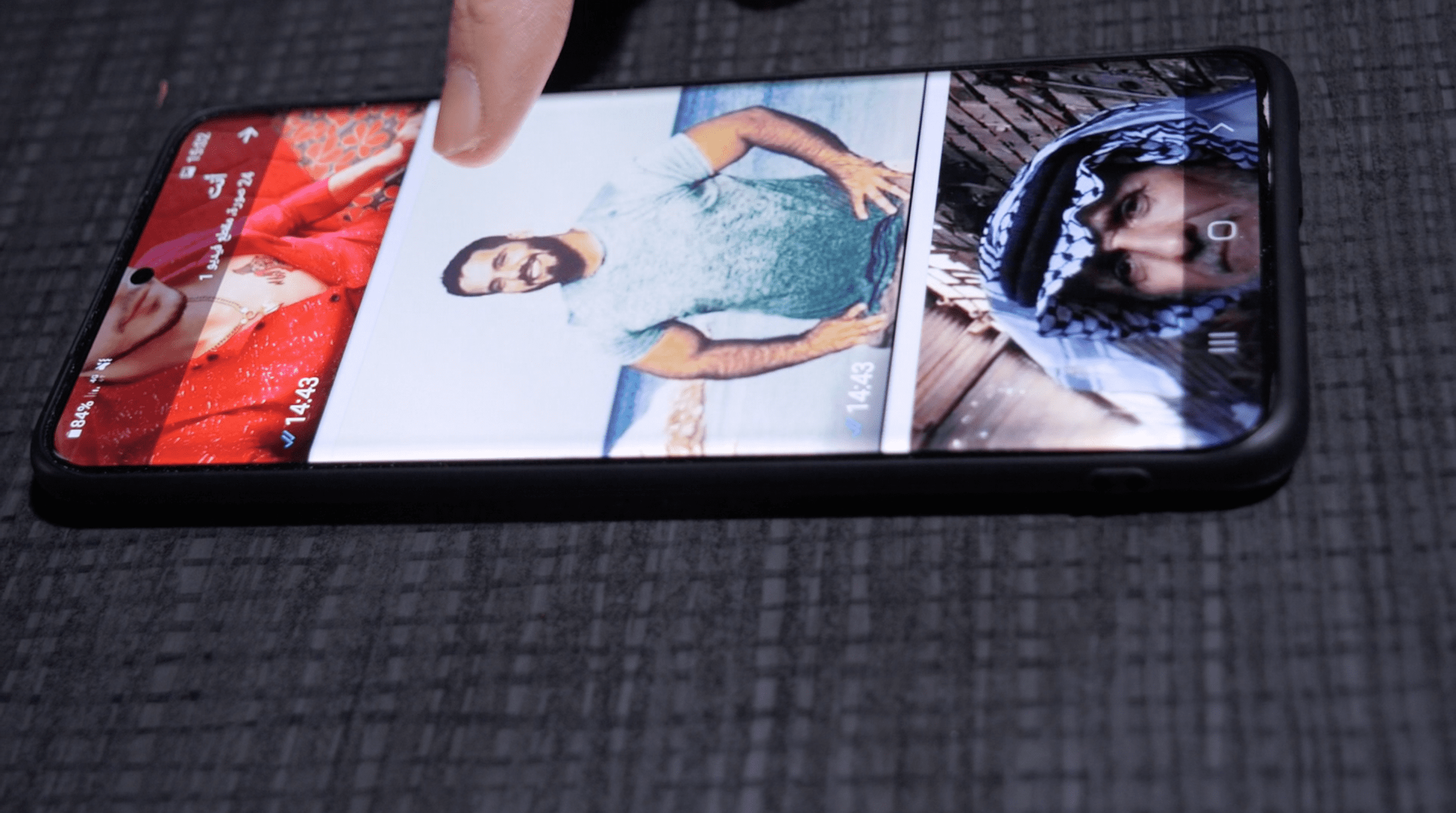 Interview with relative of the disappeared - A relative of a person who drowned off the island of Rhodes along with five more people in January 2021, showing photos of the disappeared during a filmed interview in Athens a few days after the incident. The survivors in the group were pushed back, and the six deaths were never registered by the Greek authorities. (Forensic Architecture/Forensis, 2022)