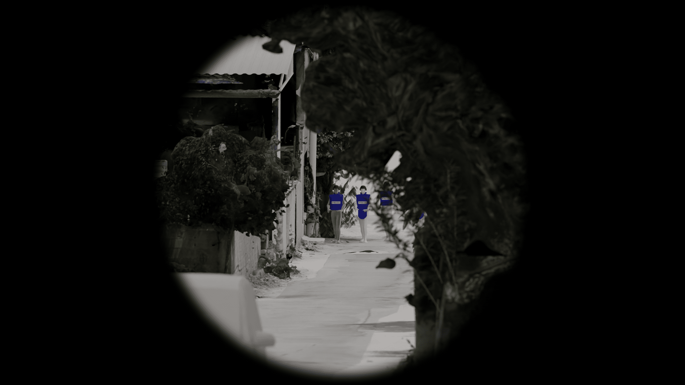 Approach-Position_Cropped - Digital reconstruction of the visibility of the journalists’ vests as seen from the location of the marksman, replicating the effect of the optical scope they most likely used (Trijicon COG x4), in the moment just before the first round of shots began. (Forensic Architecture and Al-Haq, 2022)