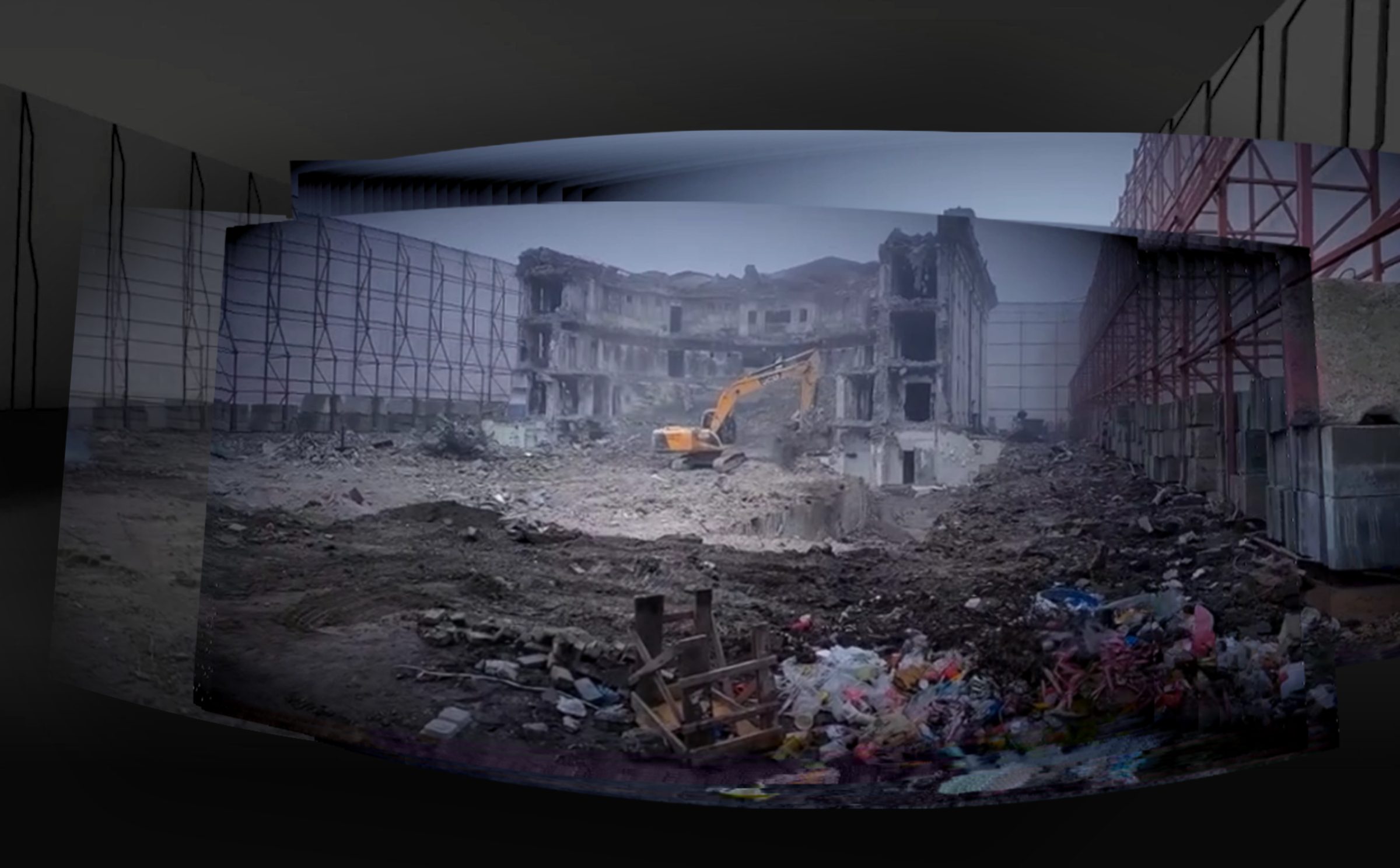 Ruined and excavated theatre - Video taken of the ruins of the Mariupol Drama Theatre being bulldozed behind scaffolding put up by Russian forces, overlaid on a 3D model.
Image source: Peter Andryushchenko, Telegram. (Center for Spatial Technologies)