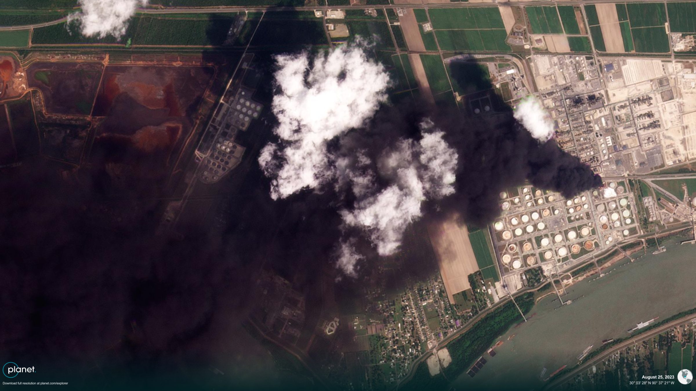 Marathon Plume - A satellite image captured by Planet Labs’ PSB.SD instrument at 11:23am on 25 August showing one tank covered in foam and another engulfed in smoke. (©️ Planet Labs PBC)
