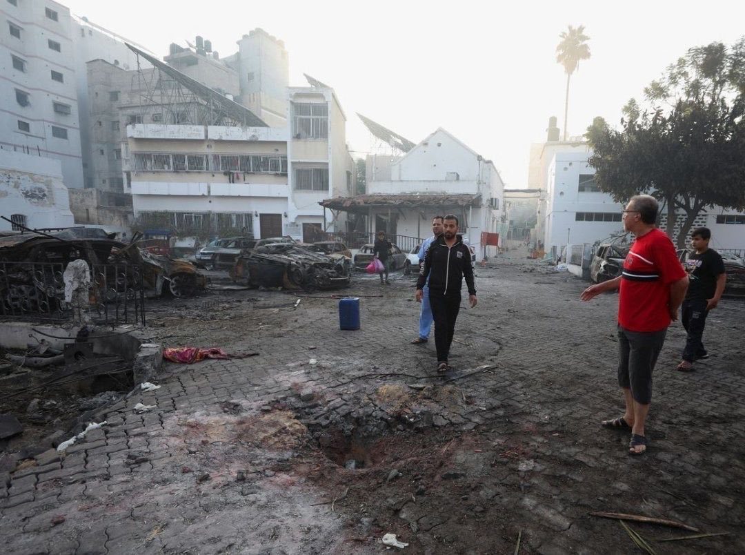 Al-Ahli Crater - Photograph of the crater in the courtyard of al-Ahli Hospital, taken on 18 October 2023. Image source: Reuters. Not for reproduction.