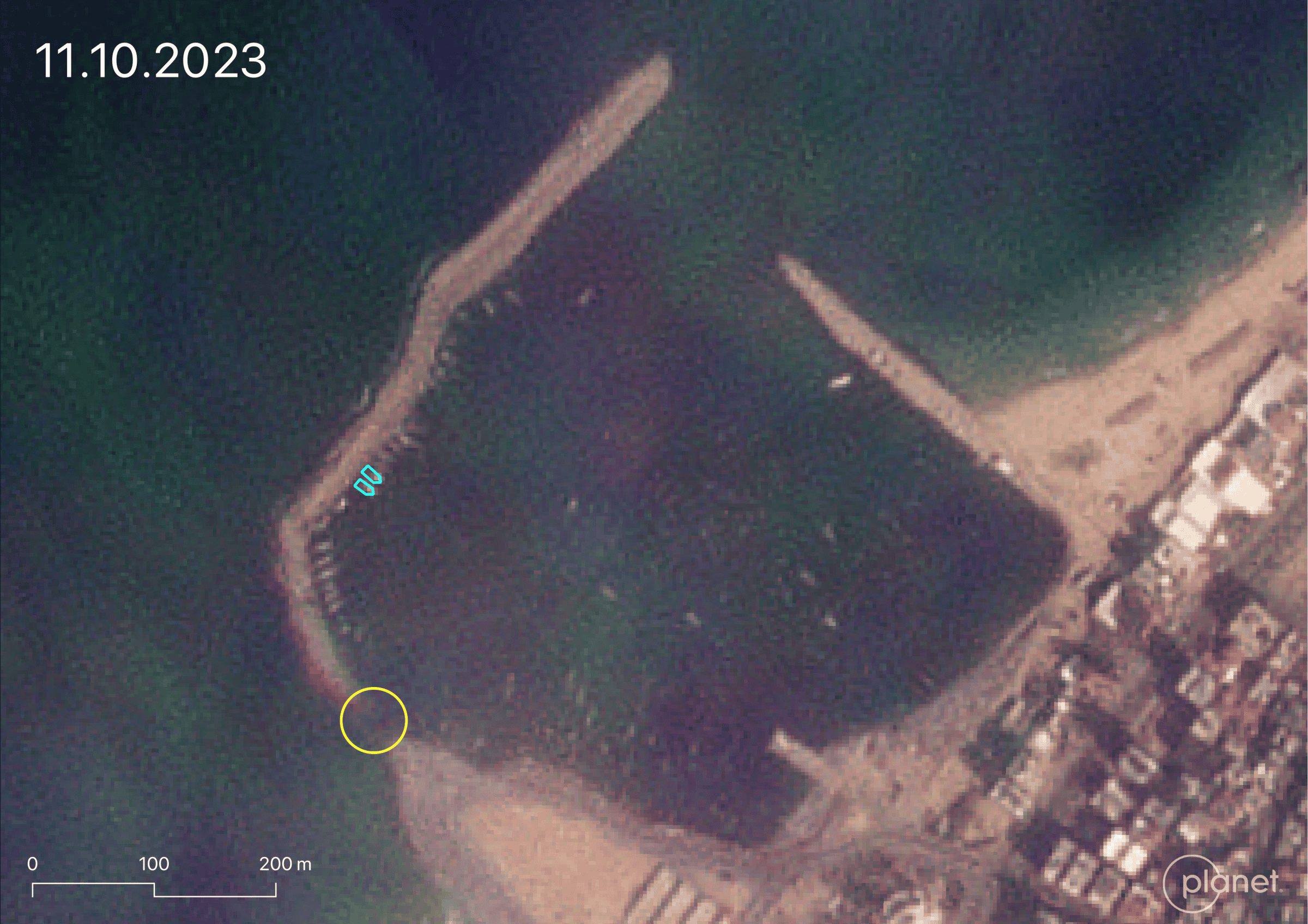  - Fig 3. The first visible damage to the port: a crater in the southern sea wall. Image: 11 October 2023 © Planet Labs PBC (Forensic Architecture, 2025)