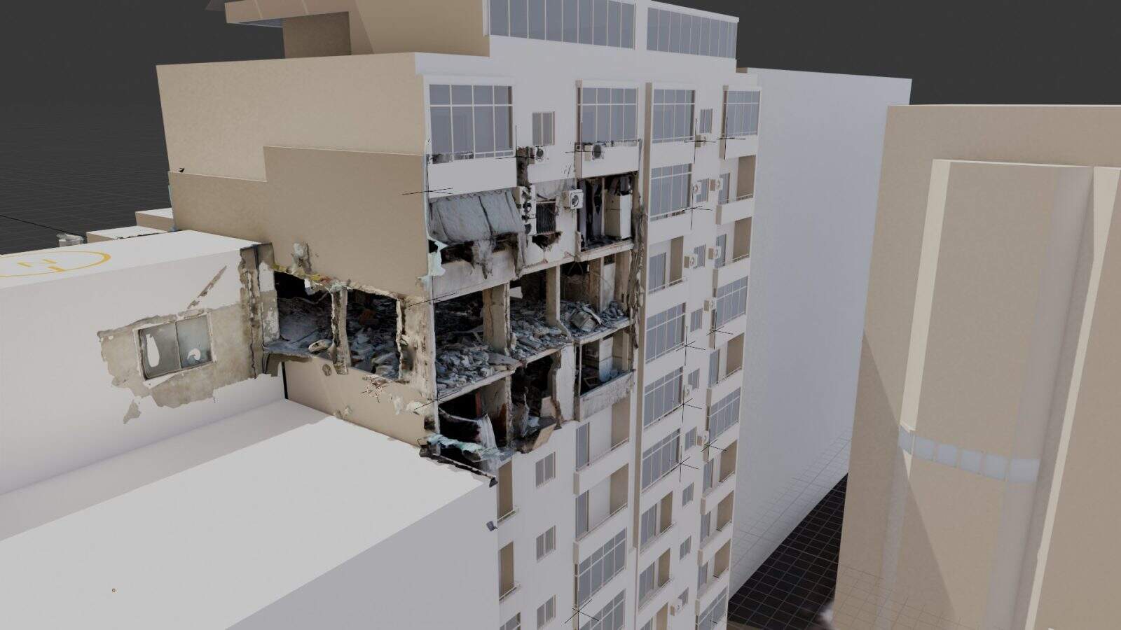 North and east façade of the Cherri building - North and east façade of the Cherri building after the attack, in FA’s digital model.